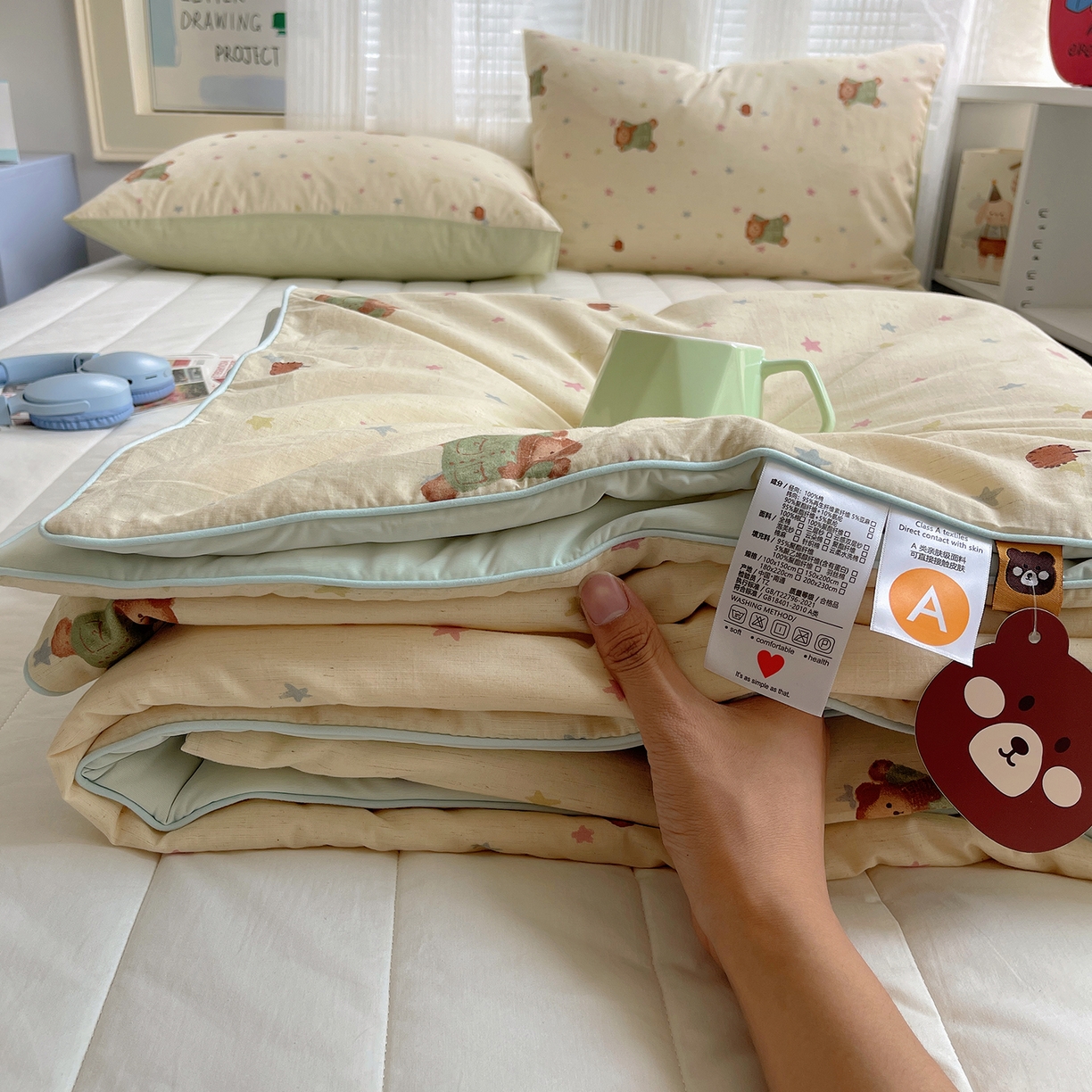 91家纺网 家纺一手货源 找家纺 桃子家居 2026新款A类原生态纯棉棉麻凉感小冰皮嵌绳工艺棉麻夏被夏凉被空调被 棉麻冰皮-奶黄小熊