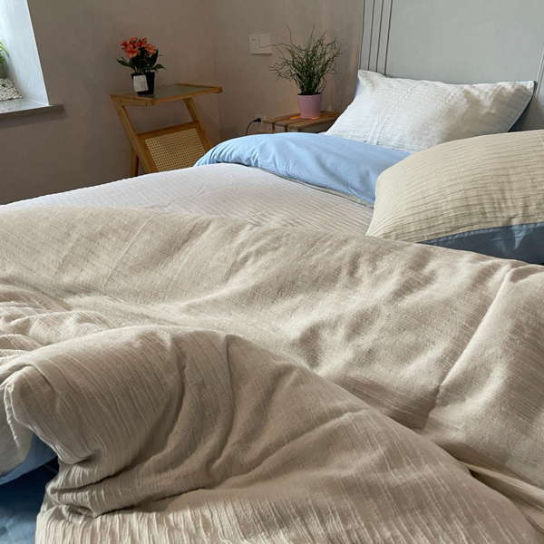 91家纺网 家纺一手货源 找家纺 沐晴2022新款简约纯棉双拼泡泡纱全棉床单床笠款四件套天空蓝