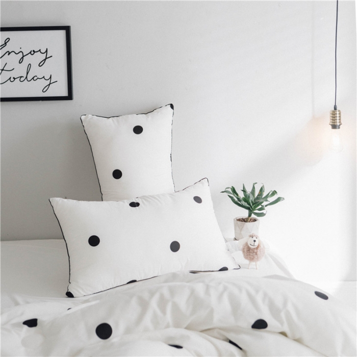 91家纺网 家纺一手货源 找家纺 时年家纺 磨毛波点枕芯48*74cm 波点（黑）