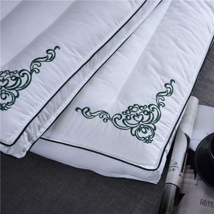 91家纺网 家纺一手货源 找家纺 赛格时代家居 全棉刺绣定型羽丝绒枕芯（绿色）