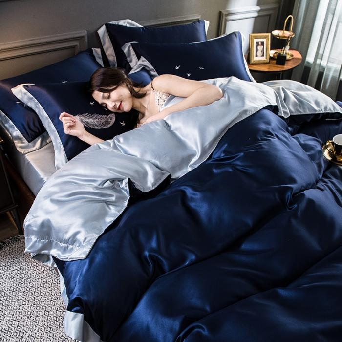 91家纺网 家纺一手货源 找家纺 骏腾 2022新款纯色水洗真丝刺绣四件套 羽毛-深蓝