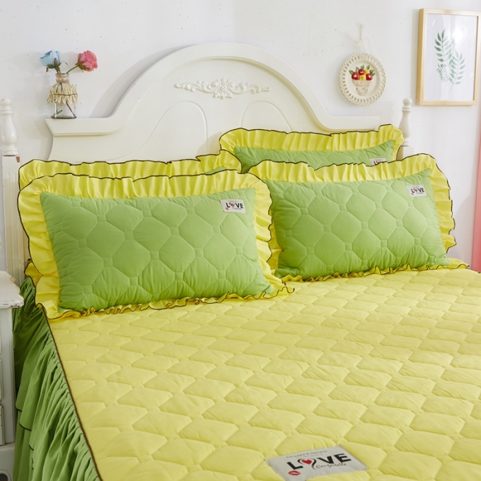 91家纺网 家纺一手货源 找家纺 艾裙海 2025新款床裙款全夹棉四件套 黄拼果绿