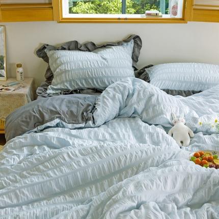 91家纺网 家纺一手货源 找家纺 花伞 2021新款工艺款泡泡纱+水洗棉四件套 浅蓝泡泡