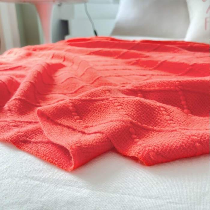 91家纺网 家纺一手货源 找家纺 朴尔针织流苏搭毯搭巾盖毯沙发巾床尾毯床尾旗酒店毯毛毯 大红色