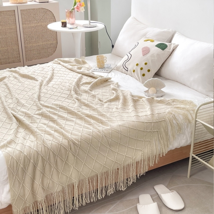91家纺网 家纺一手货源 找家纺 朴尔针织流苏搭毯搭巾盖毯沙发巾床尾毯床尾旗酒店毯毛毯 米白色