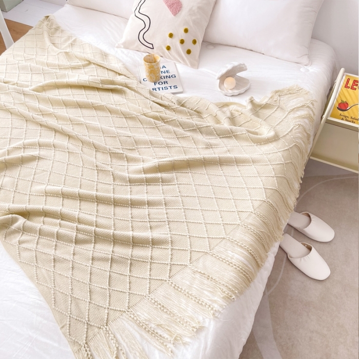 91家纺网 家纺一手货源 找家纺 朴尔针织流苏搭毯搭巾盖毯沙发巾床尾毯床尾旗酒店毯毛毯 米白色
