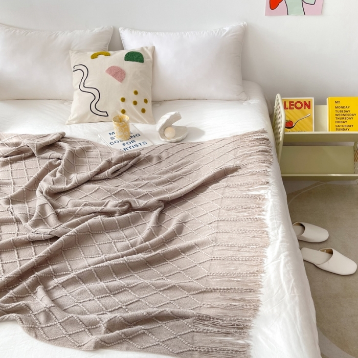 91家纺网 家纺一手货源 找家纺 朴尔针织流苏搭毯搭巾盖毯沙发巾床尾毯床尾旗酒店毯毛毯 浅咖色