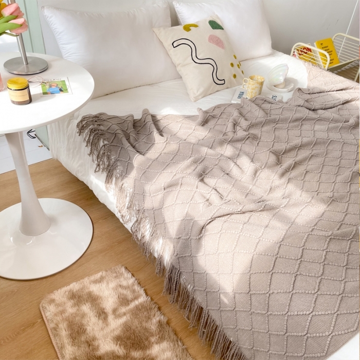 91家纺网 家纺一手货源 找家纺 朴尔针织流苏搭毯搭巾盖毯沙发巾床尾毯床尾旗酒店毯毛毯 浅咖色