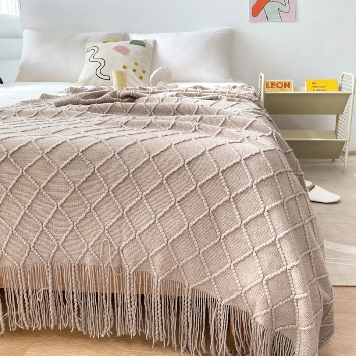 91家纺网 家纺一手货源 找家纺 朴尔针织流苏搭毯搭巾盖毯沙发巾床尾毯床尾旗酒店毯毛毯 浅咖色