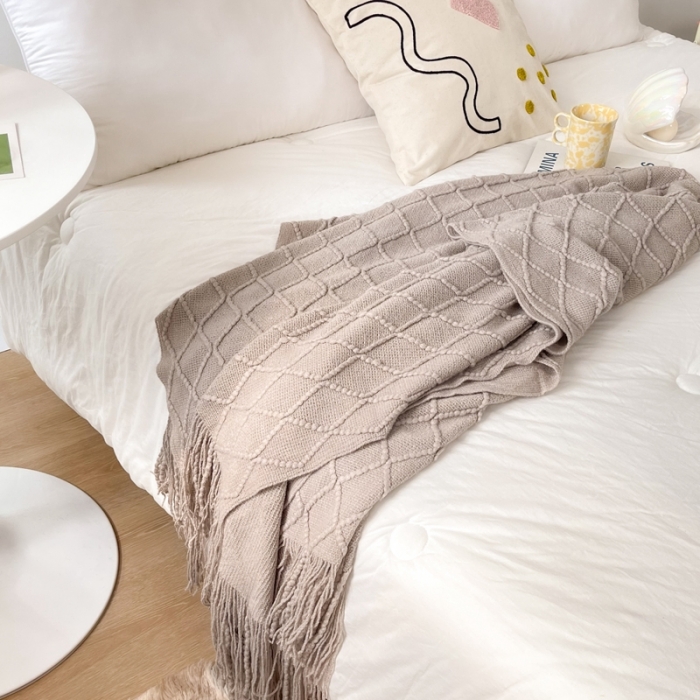 91家纺网 家纺一手货源 找家纺 朴尔针织流苏搭毯搭巾盖毯沙发巾床尾毯床尾旗酒店毯毛毯 浅咖色