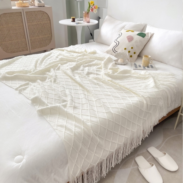 91家纺网 家纺一手货源 找家纺 朴尔针织流苏搭毯搭巾盖毯沙发巾床尾毯床尾旗酒店毯毛毯 乳白色