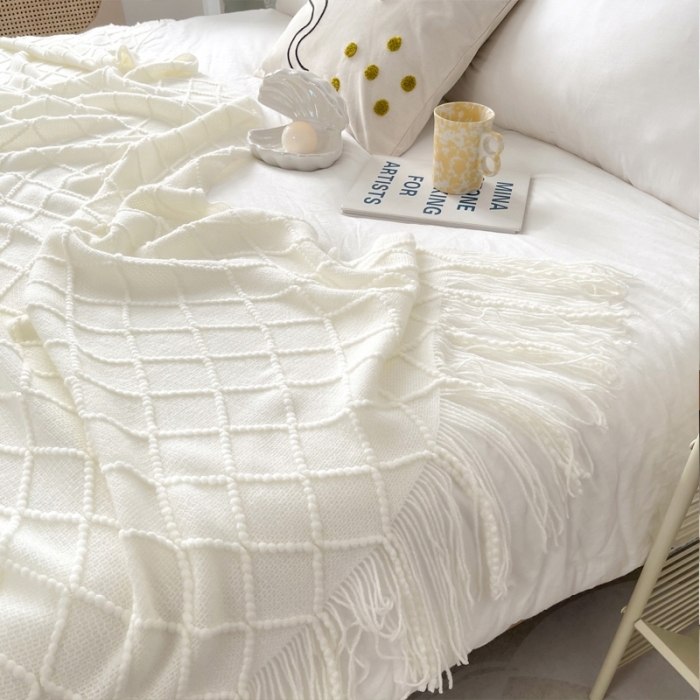 91家纺网 家纺一手货源 找家纺 朴尔针织流苏搭毯搭巾盖毯沙发巾床尾毯床尾旗酒店毯毛毯 乳白色