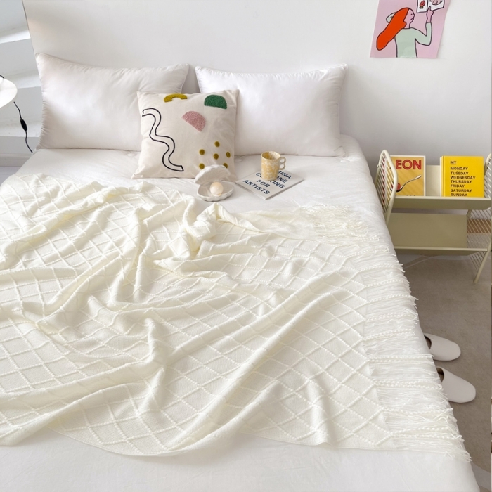 91家纺网 家纺一手货源 找家纺 朴尔针织流苏搭毯搭巾盖毯沙发巾床尾毯床尾旗酒店毯毛毯 乳白色