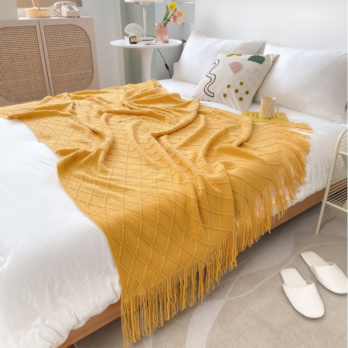 91家纺网 家纺一手货源 找家纺 朴尔针织流苏搭毯搭巾盖毯沙发巾床尾毯床尾旗酒店毯毛毯 杏黄色