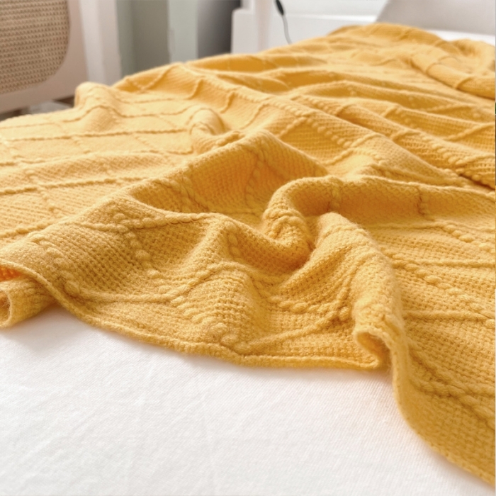 91家纺网 家纺一手货源 找家纺 朴尔针织流苏搭毯搭巾盖毯沙发巾床尾毯床尾旗酒店毯毛毯 杏黄色