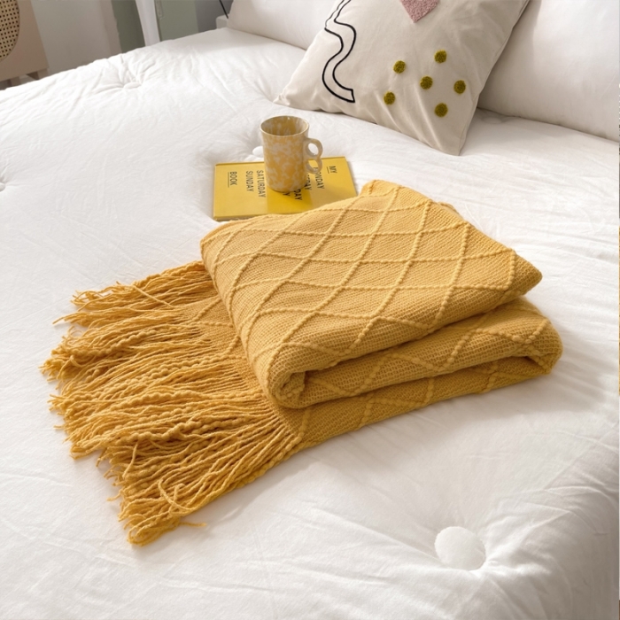 91家纺网 家纺一手货源 找家纺 朴尔针织流苏搭毯搭巾盖毯沙发巾床尾毯床尾旗酒店毯毛毯 杏黄色