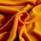91家纺网 家纺一手货源 找家纺 纤品绘 2020新款金貂绒裙边款沙发床套 阳光橙