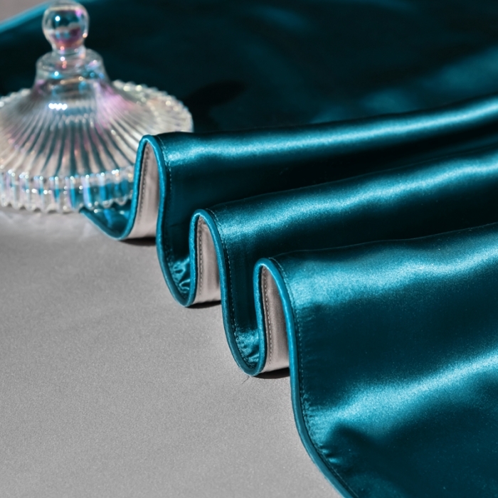 91家纺网 家纺一手货源 找家纺 雅韵诗 2023新款简约款真丝素色双拼四件套 孔雀蓝拼银灰