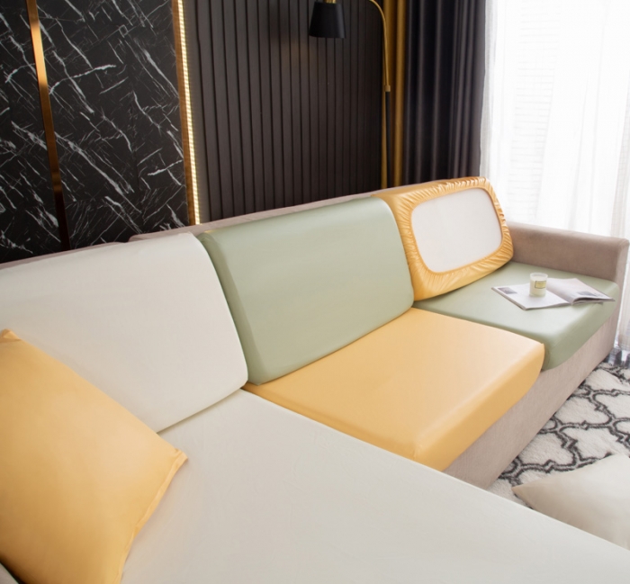 91家纺网 家纺一手货源 找家纺 兴妮雅家纺2021新款拼色皮沙发笠 米色加黄色加嫩绿