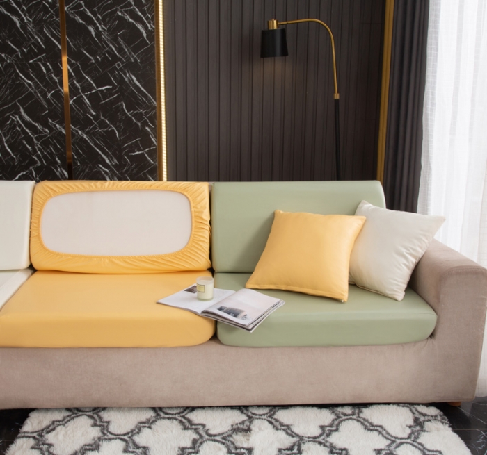 91家纺网 家纺一手货源 找家纺 兴妮雅家纺2021新款拼色皮沙发笠 米色加黄色加嫩绿