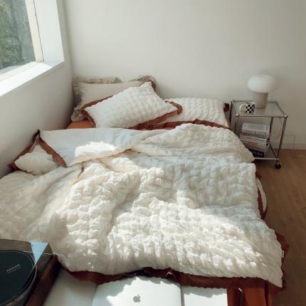 91家纺网 家纺一手货源 找家纺 桔子家纺 2022春夏新品云朵泡泡纱四件套实拍图 南瓜色