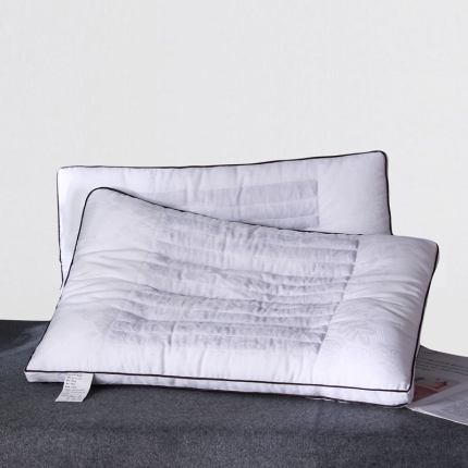 91家纺网 家纺一手货源 找家纺 全棉60S贡缎提花决明子木棉两用护颈羽丝绒枕芯定型硬枕头