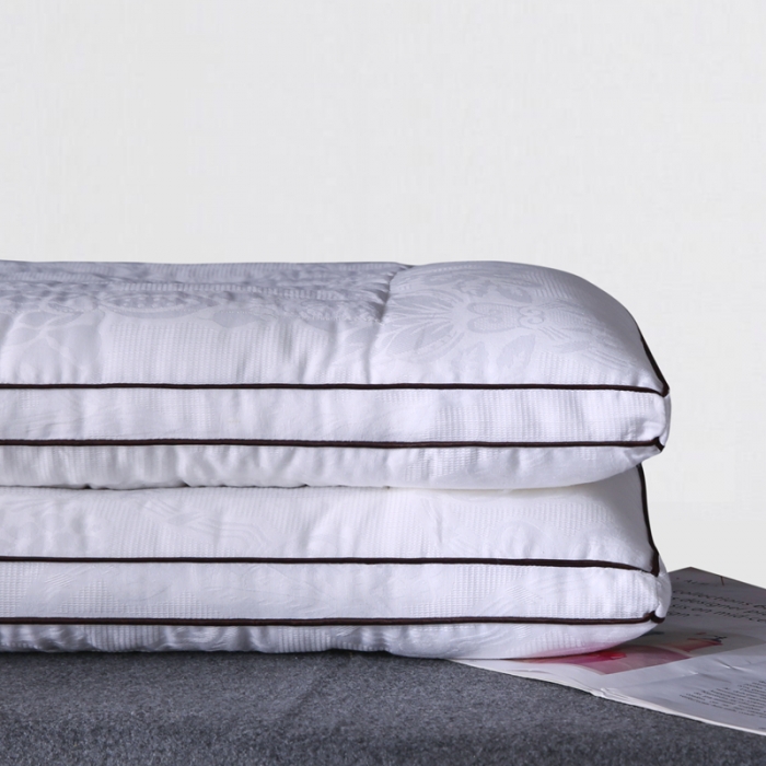 91家纺网 家纺一手货源 找家纺 全棉60S贡缎提花决明子木棉两用护颈羽丝绒枕芯定型硬枕头