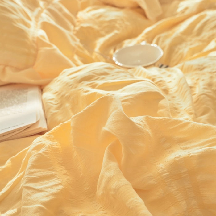 91家纺网 家纺一手货源 找家纺 ab家纺 2023新款泡泡纱水洗棉四件套 泡泡纱姜黄