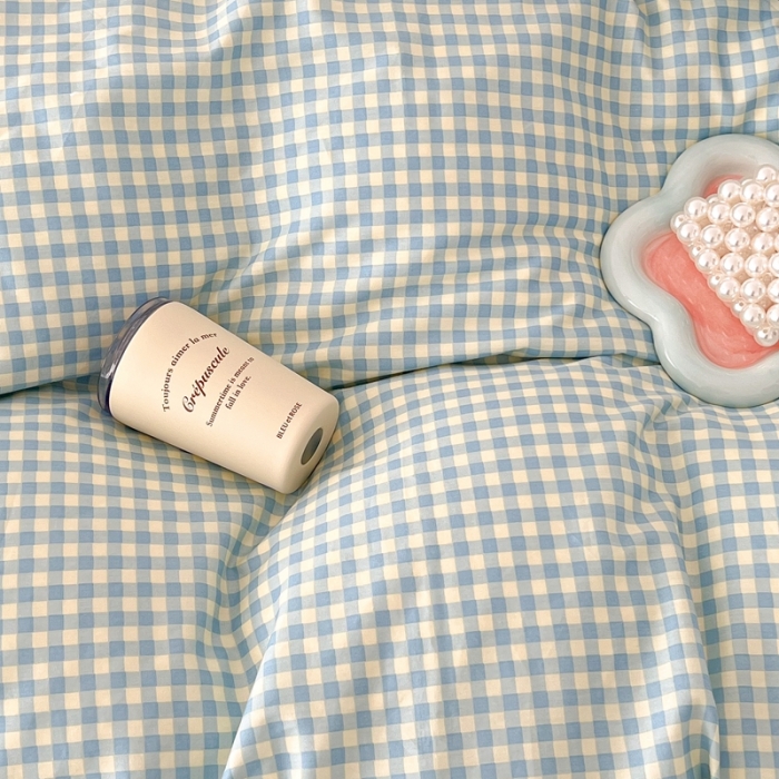 91家纺网 家纺一手货源 找家纺 昔可家纺 2022新款全棉贝壳三角针格子款四件套 奶蓝格