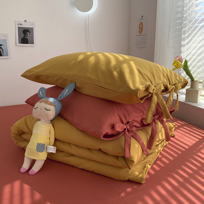 91家纺网 家纺一手货源 找家纺 曼谷家纺 新款美棉磨毛纯色系带混搭拼色蝴蝶结四件套 杏黄甜橙（系带款）