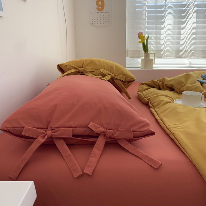 91家纺网 家纺一手货源 找家纺 曼谷家纺 新款美棉磨毛纯色系带混搭拼色蝴蝶结四件套 杏黄甜橙（系带款）