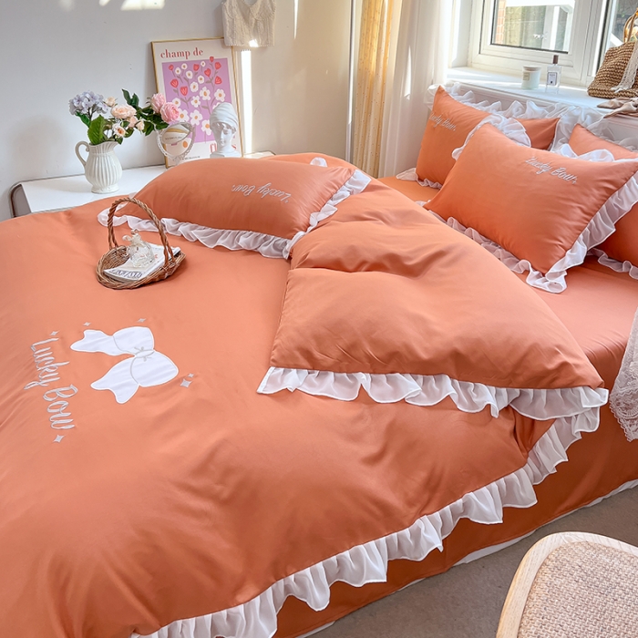 91家纺网 家纺一手货源 找家纺 沐慕 22新款水洗真丝刺绣花边四件套 紫幸运蝴蝶结-桔色