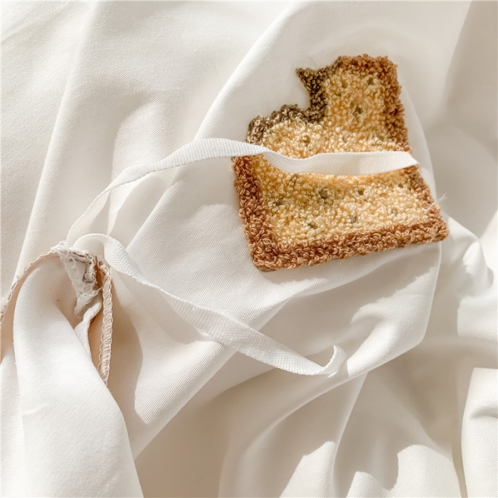 91家纺网 家纺一手货源 找家纺 蜜柚 2024款全棉曲奇毛巾绣系列四件套 曲奇饼干-卡其