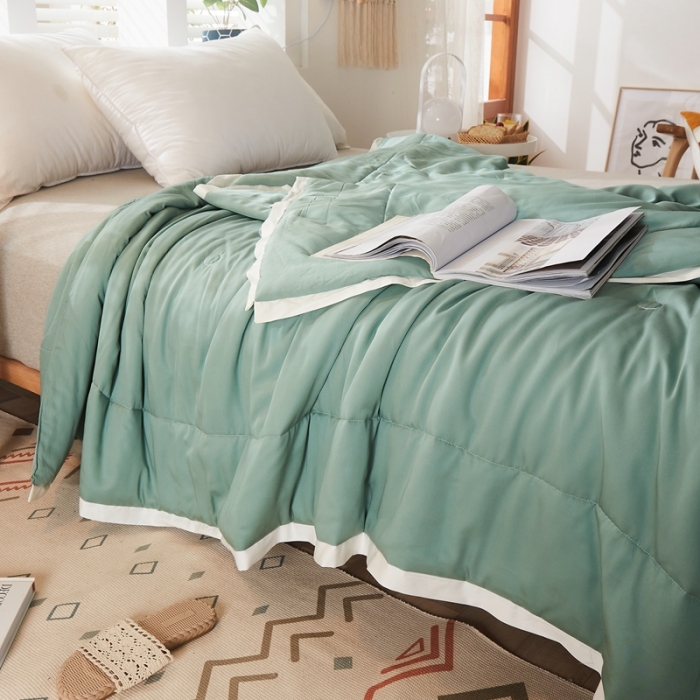 91家纺网 家纺一手货源 找家纺 找底底家纺 2022新款负离子功能性夏被 苹果绿