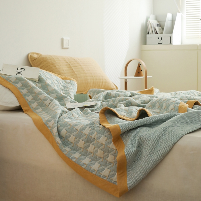 91家纺网 家纺一手货源 找家纺 吾秀家居 2022新款高端全棉针织提花毯 方块千鸟格绿