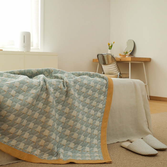 91家纺网 家纺一手货源 找家纺 吾秀家居 2022新款高端全棉针织提花毯 方块千鸟格绿