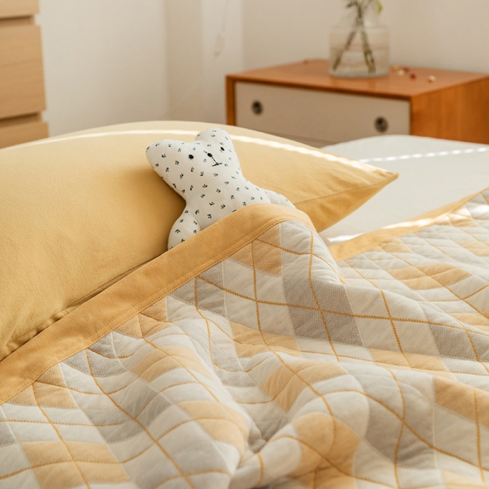 91家纺网 家纺一手货源 找家纺 吾秀家居 2022新款高端全棉针织提花毯菱格黄