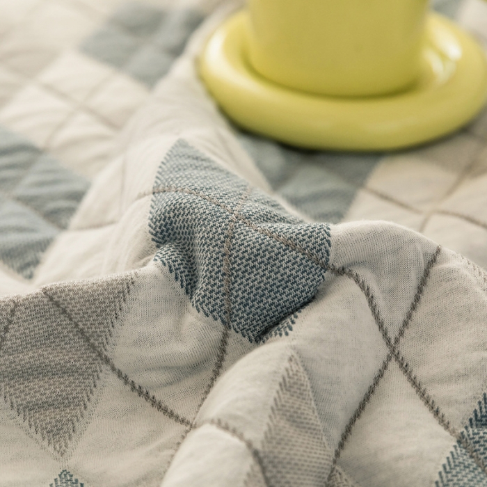 91家纺网 家纺一手货源 找家纺 吾秀家居 2022新款高端全棉针织提花毯 菱格蓝