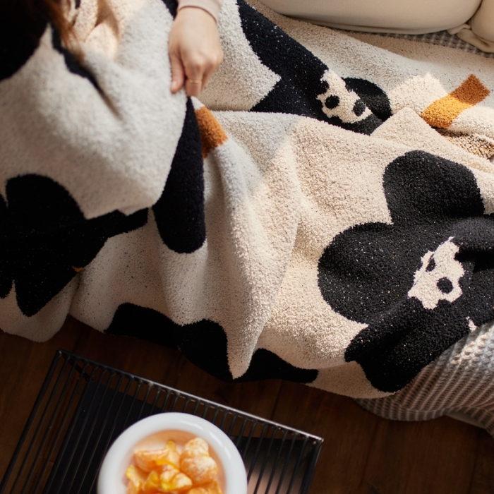 91家纺网 家纺一手货源 找家纺 总 安莱2022新款设计师太阳花A类半边绒针织毯子午睡毯秋冬