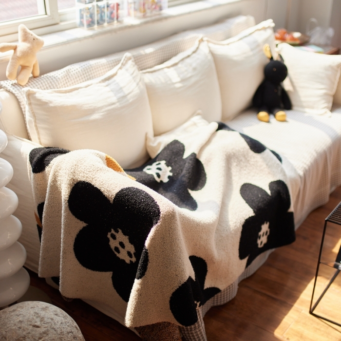 91家纺网 家纺一手货源 找家纺 安莱 2022新款设计师太阳花A类半边绒针织毯子午睡毯秋冬 向阳花