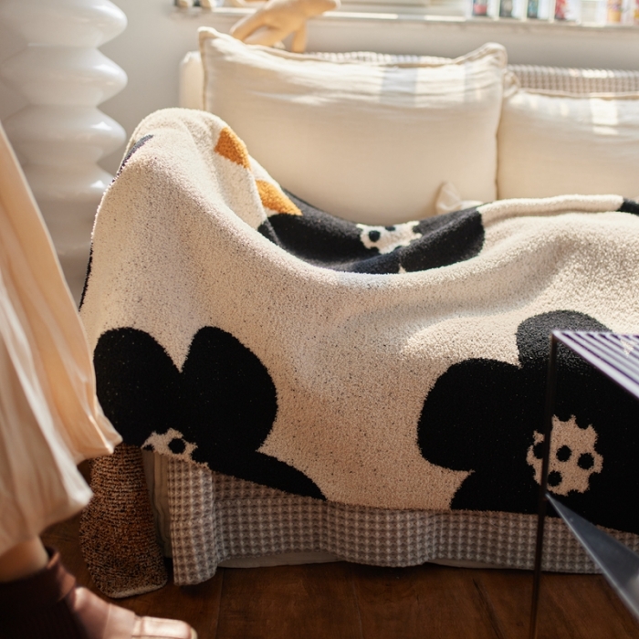 91家纺网 家纺一手货源 找家纺 安莱 2022新款设计师太阳花A类半边绒针织毯子午睡毯秋冬 向阳花