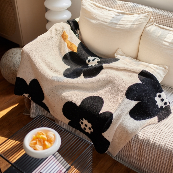 91家纺网 家纺一手货源 找家纺 安莱 2022新款设计师太阳花A类半边绒针织毯子午睡毯秋冬 向阳花