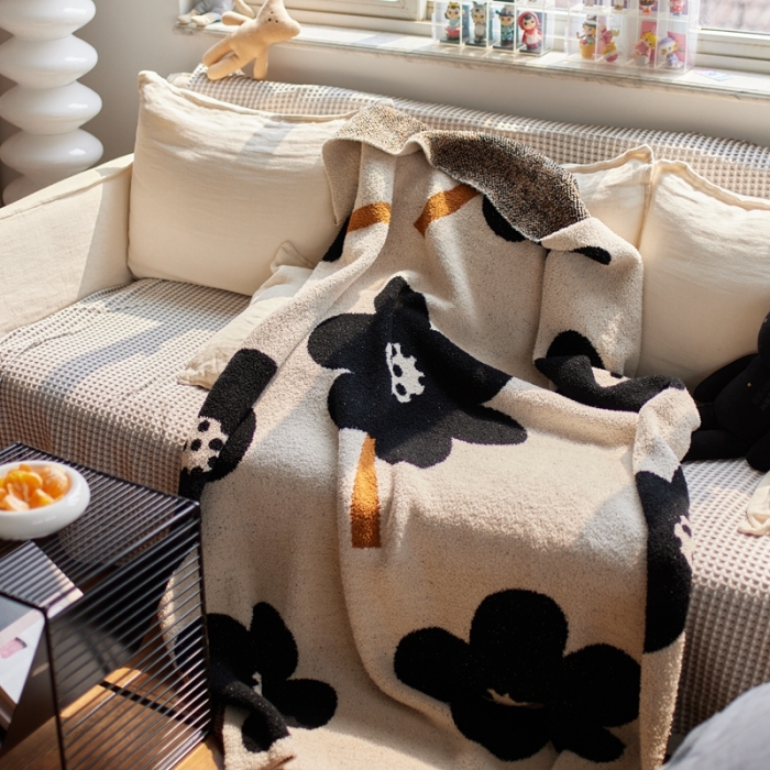 91家纺网 家纺一手货源 找家纺 安莱 2022新款设计师太阳花A类半边绒针织毯子午睡毯秋冬 向阳花