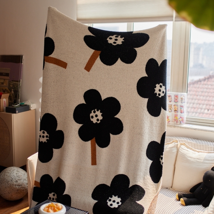 91家纺网 家纺一手货源 找家纺 安莱 2022新款设计师太阳花A类半边绒针织毯子午睡毯秋冬 向阳花