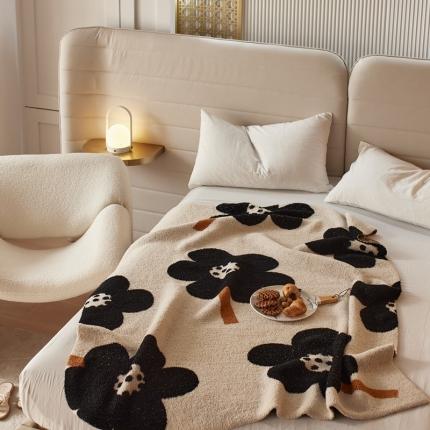 91家纺网 家纺一手货源 找家纺 总 安莱 设计师太阳花A类半边绒针织毯子沙发办公室午睡毯秋冬