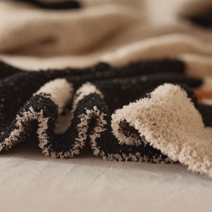 91家纺网 家纺一手货源 找家纺 总 安莱 设计师太阳花A类半边绒针织毯子沙发办公室午睡毯秋冬