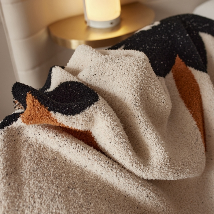 91家纺网 家纺一手货源 找家纺 安莱 设计师太阳花A类半边绒针织毯子沙发办公室午睡毯秋冬 向阳花