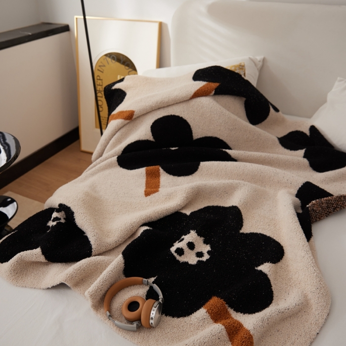 91家纺网 家纺一手货源 找家纺 总 安莱 设计师太阳花A类半边绒针织毯子沙发办公室午睡毯秋冬