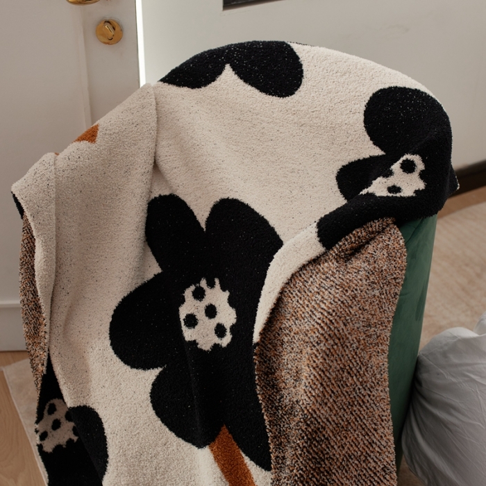 91家纺网 家纺一手货源 找家纺 总 安莱 设计师太阳花A类半边绒针织毯子沙发办公室午睡毯秋冬