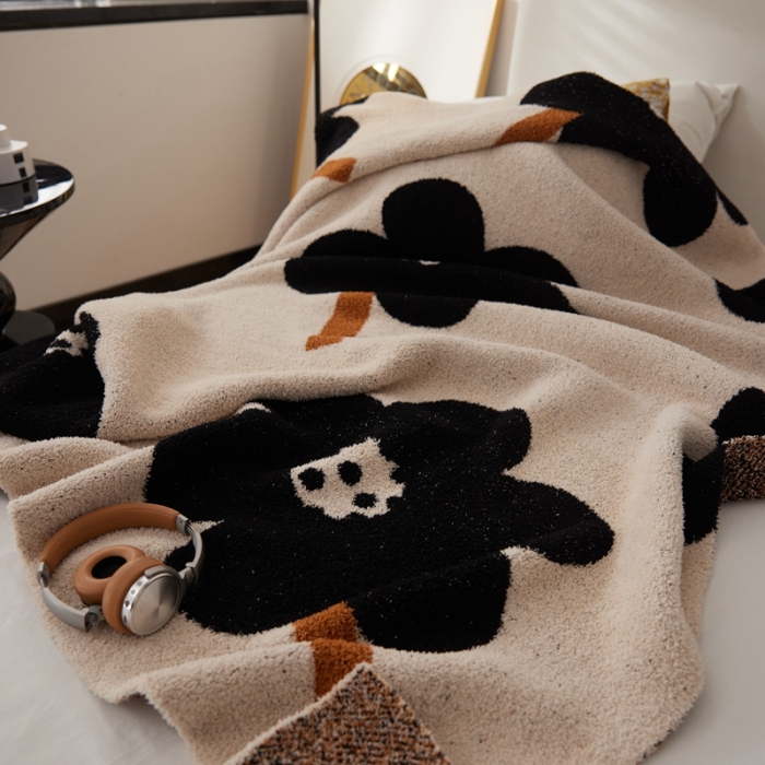 91家纺网 家纺一手货源 找家纺 安莱 设计师太阳花A类半边绒针织毯子沙发办公室午睡毯秋冬 向阳花